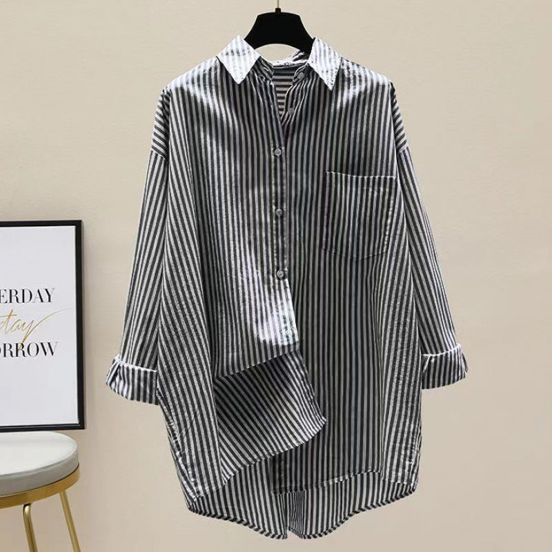 Striped women's oversized button down longline shirt with chest pocket, relaxed fit for elegant casual spring fashion.