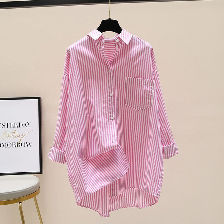 Casual women's striped oversized shirt, longline button down with chest pocket, relaxed fit for spring fashion.