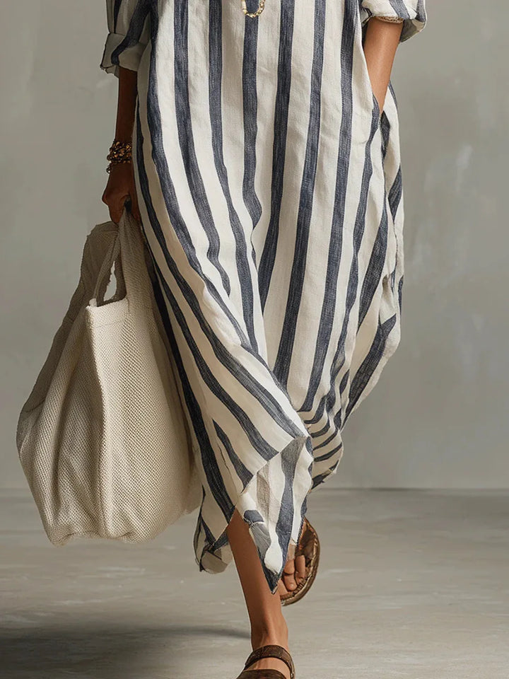 Women's striped oversized maxi shirt dress, an effortless style for casual and summer fashion.