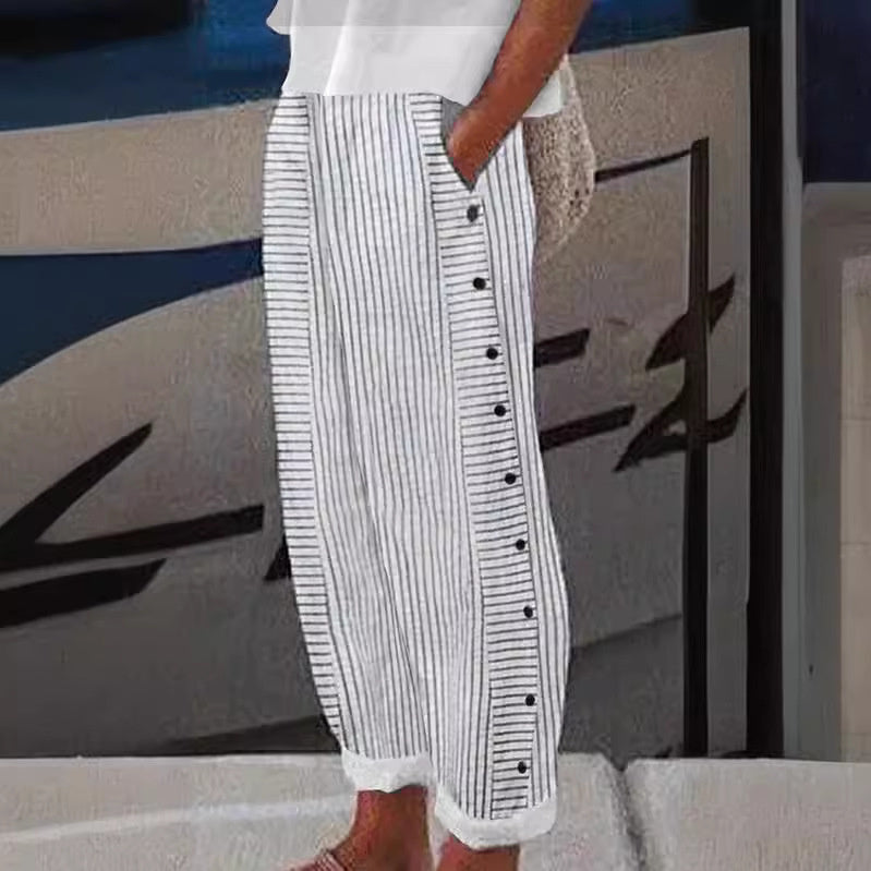 Women's striped pants with button accents & a relaxed fit. Casual chic & comfortable for everyday style.