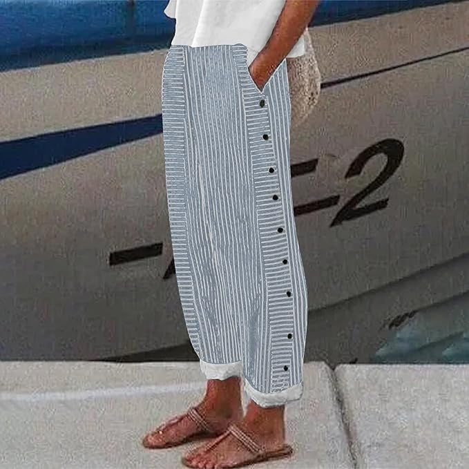 Comfortable women's relaxed fit striped pants. Features an elastic waist & stylish button accents for casual wear.