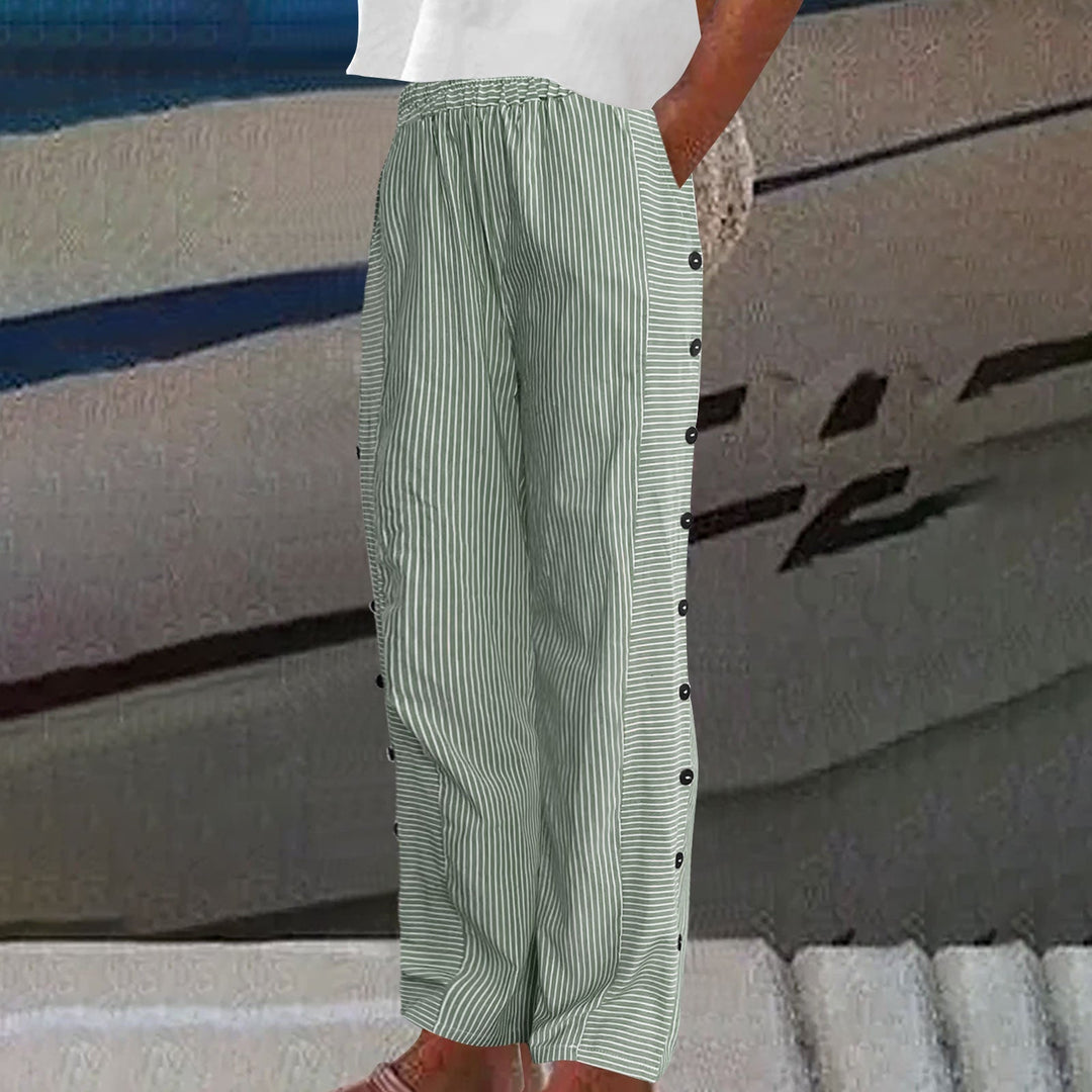Model wearing women's relaxed fit striped pants with button accents, perfect for casual and comfortable chic.