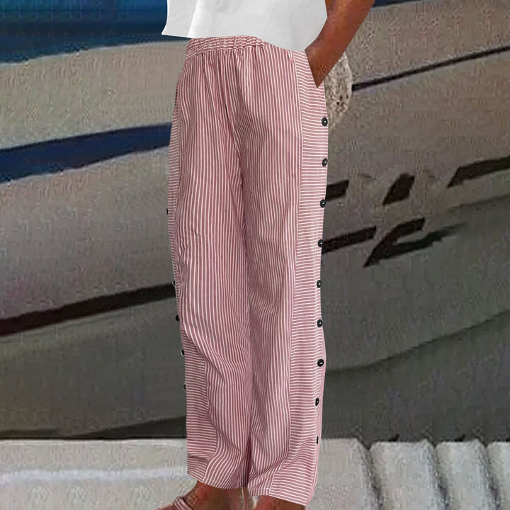 Women's striped, relaxed fit pants with chic button accents & elastic waist. Ideal for comfortable, casual everyday style.