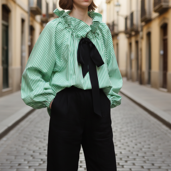 Women's striped ruffle bow tie blouse with elegant balloon sleeves, perfect for chic office wear.