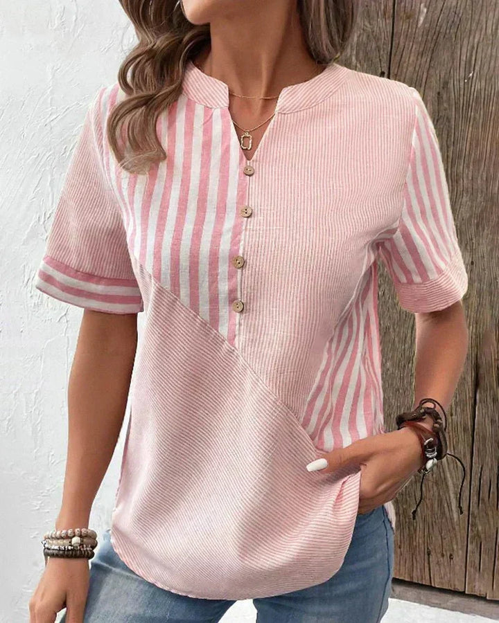 Women's striped short sleeve blouse for an elegant casual chic look. Versatile spring & summer top.