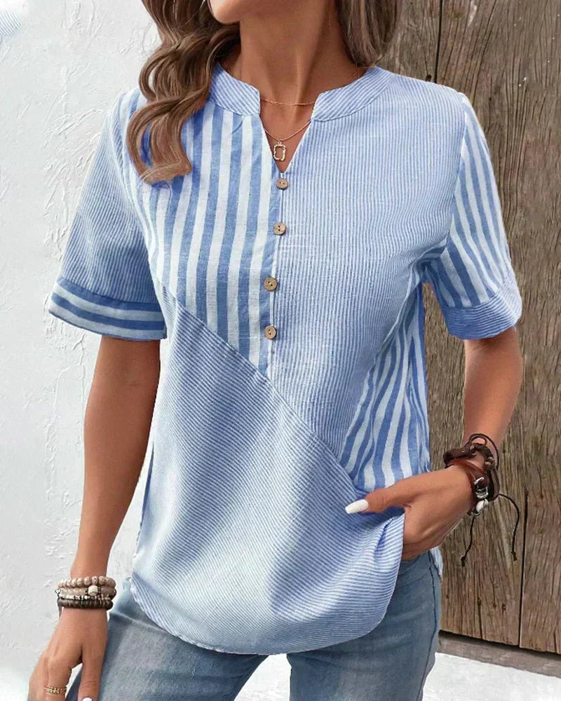 Stylish women's striped short sleeve top. An effortless and versatile blouse for any occasion.