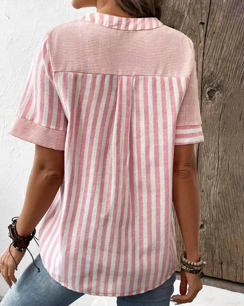 Elegant women's striped short sleeve blouse, ideal for spring and summer fashion. Casual chic style.
