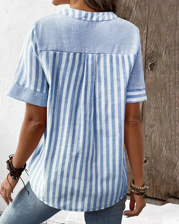 Women's short sleeve striped top. A chic blouse, perfect for office wear or a casual summer day.