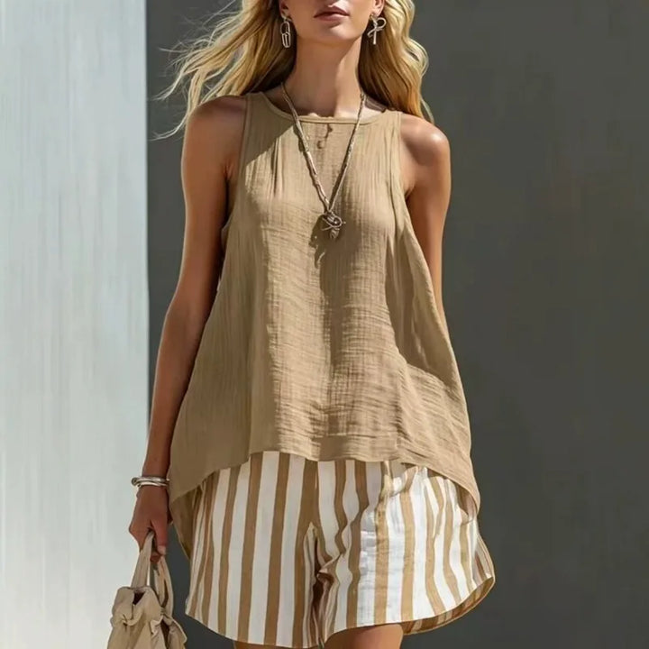 Sleeveless striped tank top and shorts beachwear set for women, a stylish vacation and summer outfit.