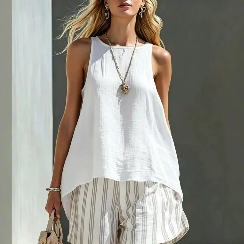 Women's striped shorts with a comfortable fit, paired with a tank top for a chic summer outfit.