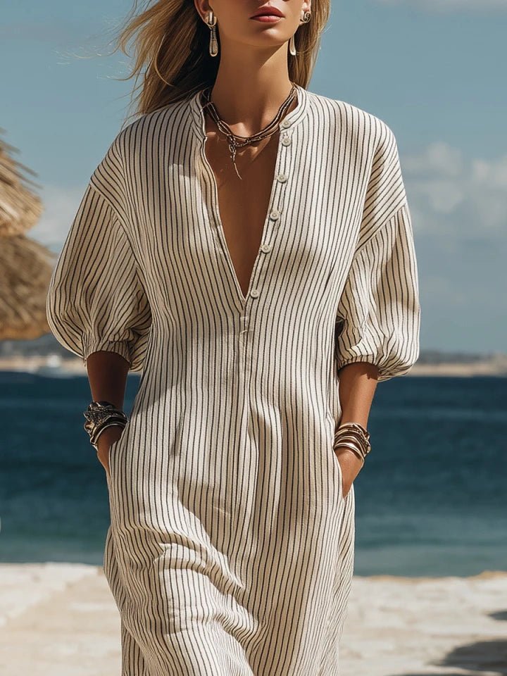 Elegant striped V-neck maxi dress with puff sleeves & side split. Ideal women's summer button-down.