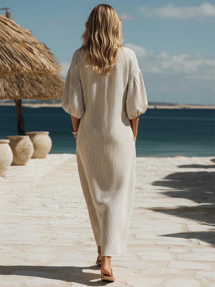 Striped V-neck maxi dress, women's button-down with puff sleeves & stylish side split. Summer fashion.