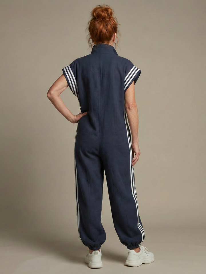 Striped women's fashion jumpsuit, one piece with zip front for elegant comfort.