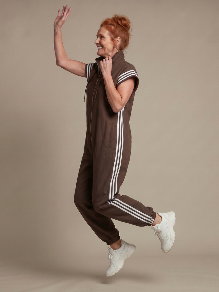 Relaxed fit striped zip front jumpsuit, comfortable women's everyday fashion.