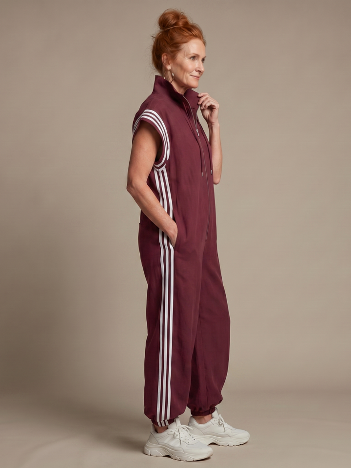 Relaxed fit striped jumpsuit with zip front, perfect one piece for everyday style.