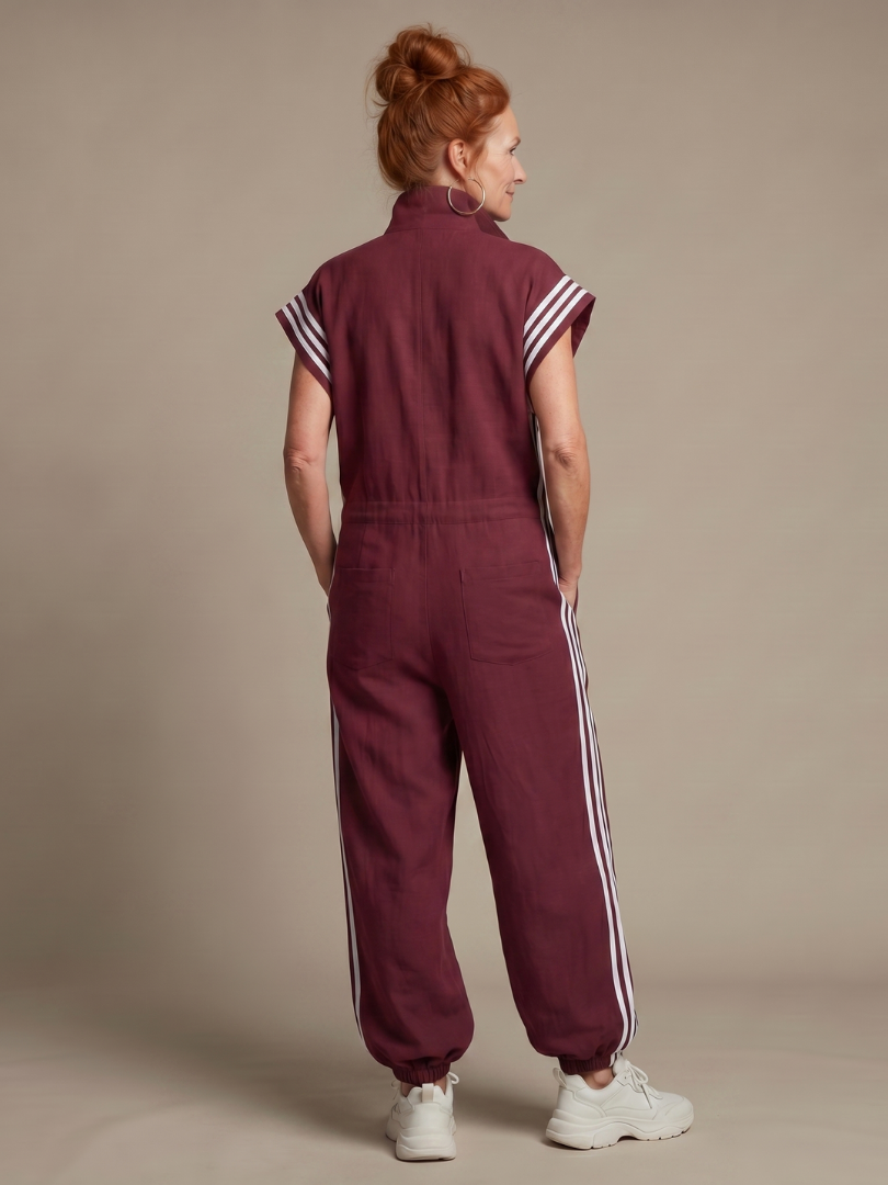 Striped one-piece jumpsuit for women, comfortable zip front and wide sleeves.