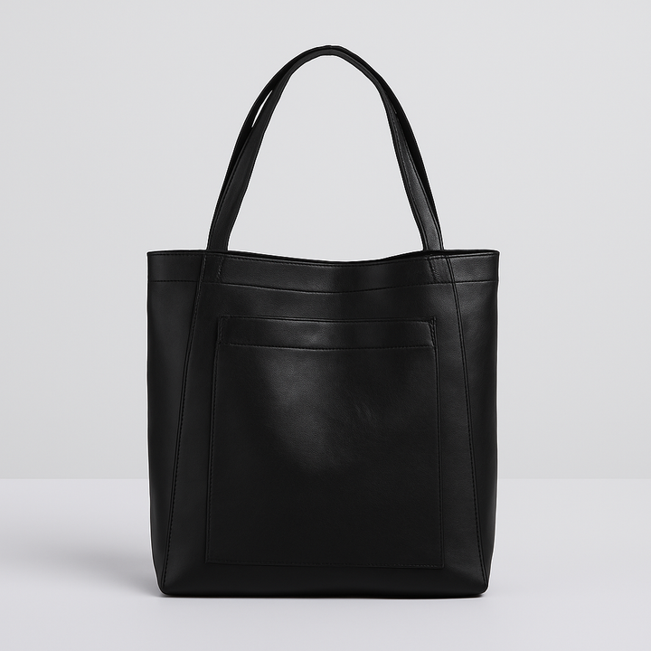 Stylish black structured women's tote bag. Versatile shoulder/crossbody carry, features an accessible exterior pocket.