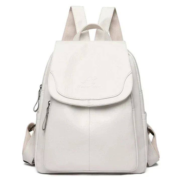 Functional women's structured flap backpack. Versatile daily bag with secure closure and adjustable straps for comfort.