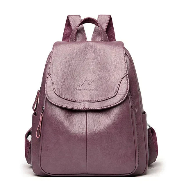 Elegant women's structured flap backpack. Perfect for daily essentials, travel, and everyday carry. Secure closure.