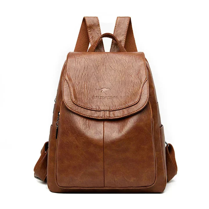 Sophisticated women's structured flap backpack. Elegant daily bag for essentials, featuring a secure flap closure.