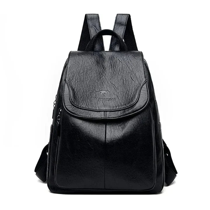 Practical women's structured flap backpack. Secure & stylish daily bag with adjustable straps for everyday carry.