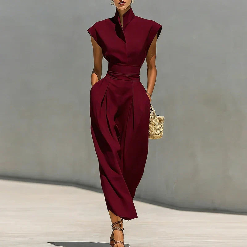 Women's structured midi dress with a cinched waist & elegant stand collar. Perfect for workwear or cocktail events.