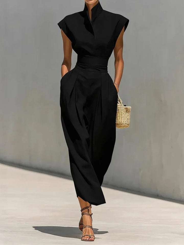 Flattering women's midi dress with a structured fit, cinched waist, and practical hidden pockets.