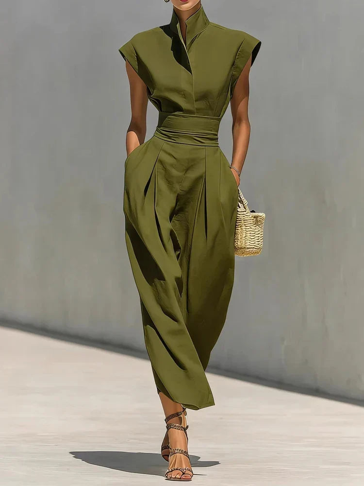 Elegant women's structured midi dress featuring a cinched waist, stand collar, and flattering silhouette.