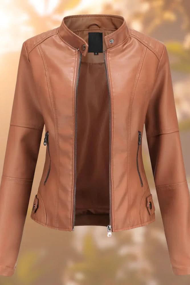 Tailored women's leather jacket with structured shoulders, a fashionable statement piece for elegant style.