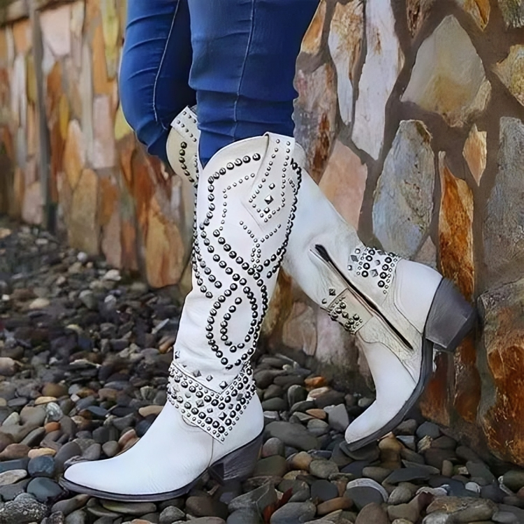 Purple women's studded knee-high Western boots, an eye-catching cowboy style statement for festival or party wear.
