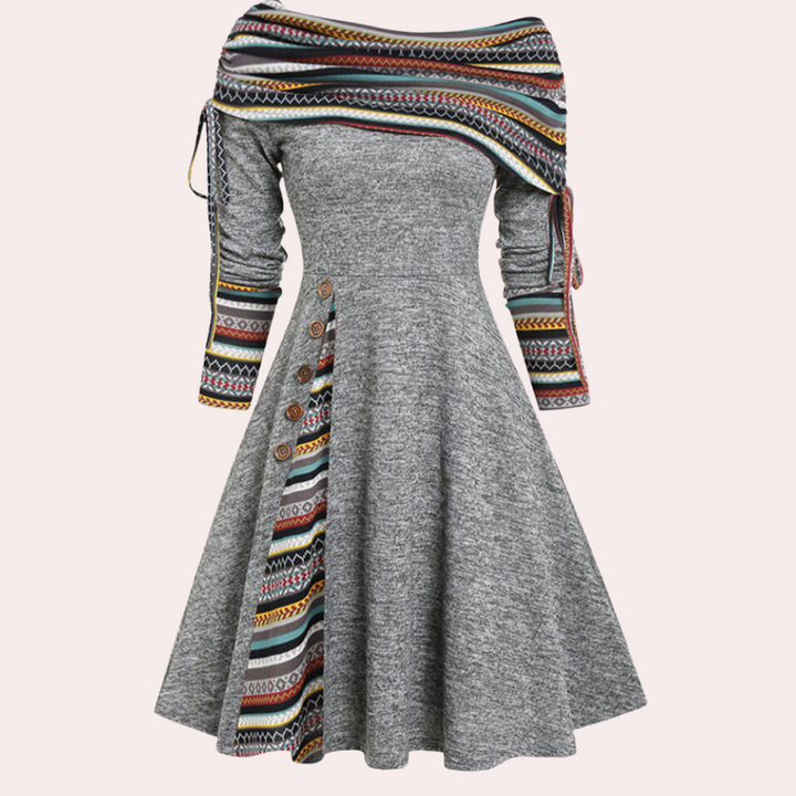Stylish women's midi A-line dress with a vibrant accent print, a versatile choice for modern fashion.