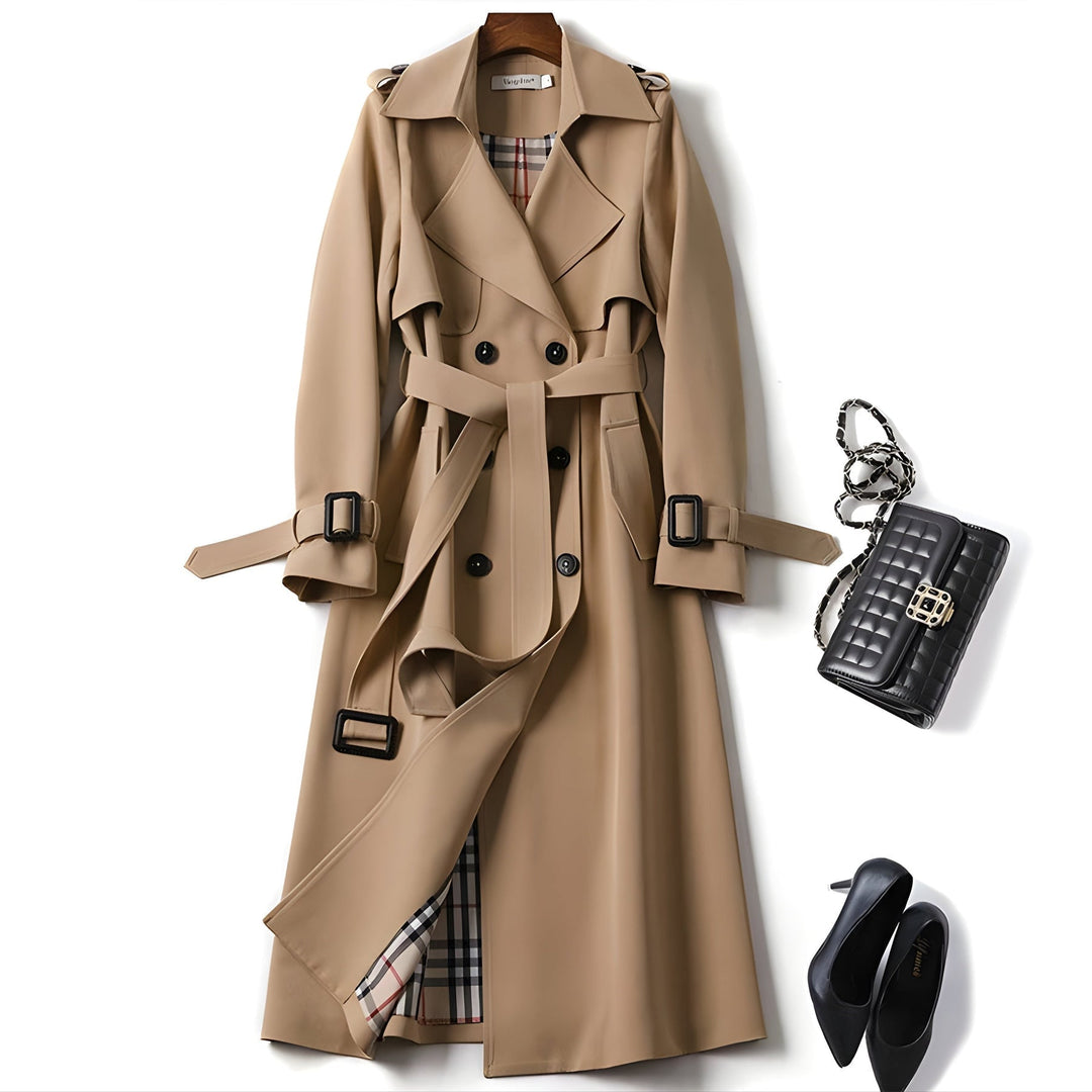 Chic women's water-resistant trench coat, belted for a flattering fit, essential spring jacket.