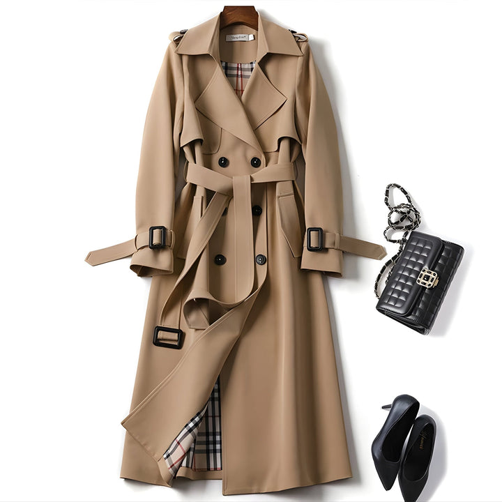 Chic women's water-resistant trench coat, belted for a flattering fit, essential spring jacket.
