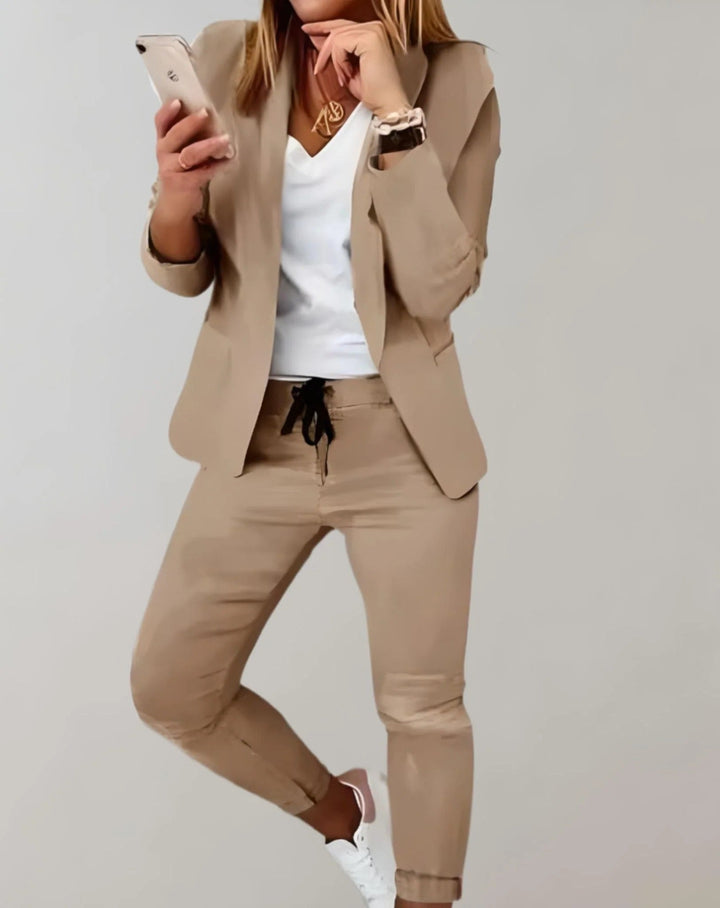 Elegant women's matching blazer and trousers set. Versatile womens clothing for office or casual occasions.