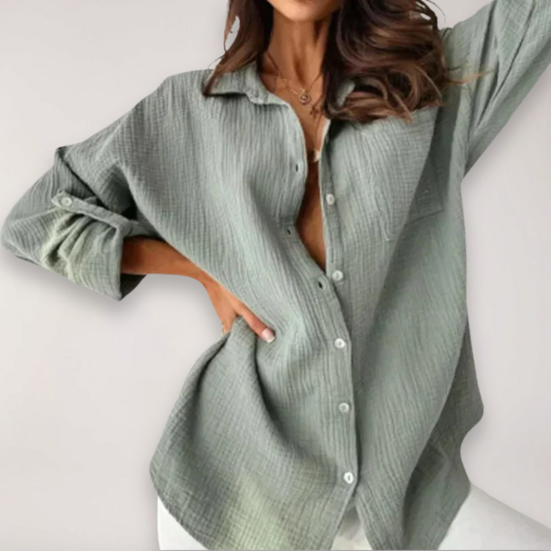 Elegant women's long sleeve button blouse with roll-up feature, ideal for office or chic casual women's fashion.
