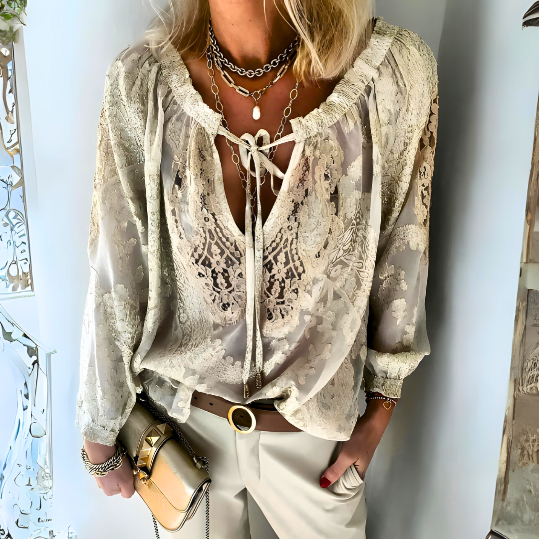 Women's stylish crocheted boho blouse. Loose fit, perfect for summer casual wear & bohemian fashion.