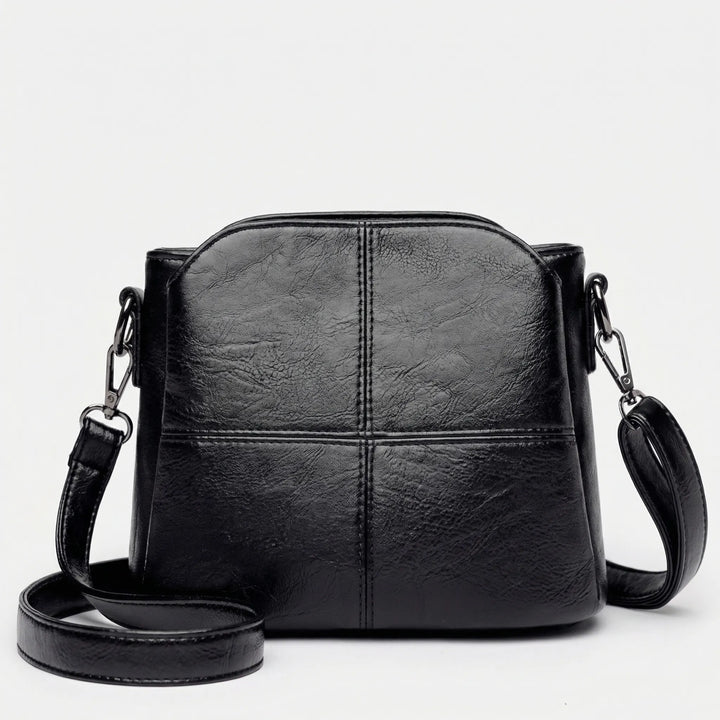 New women's fashion crossbody bag with intricate stitched design, adjustable strap, a perfect gift.