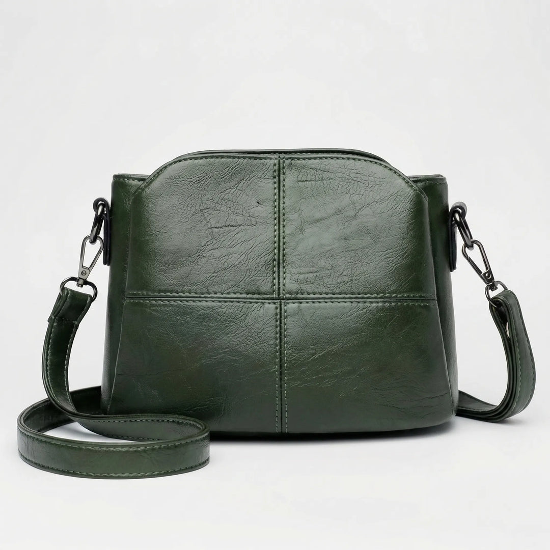 Chic women's crossbody shoulder bag, featuring a stylish stitched design. A versatile daily accessory.