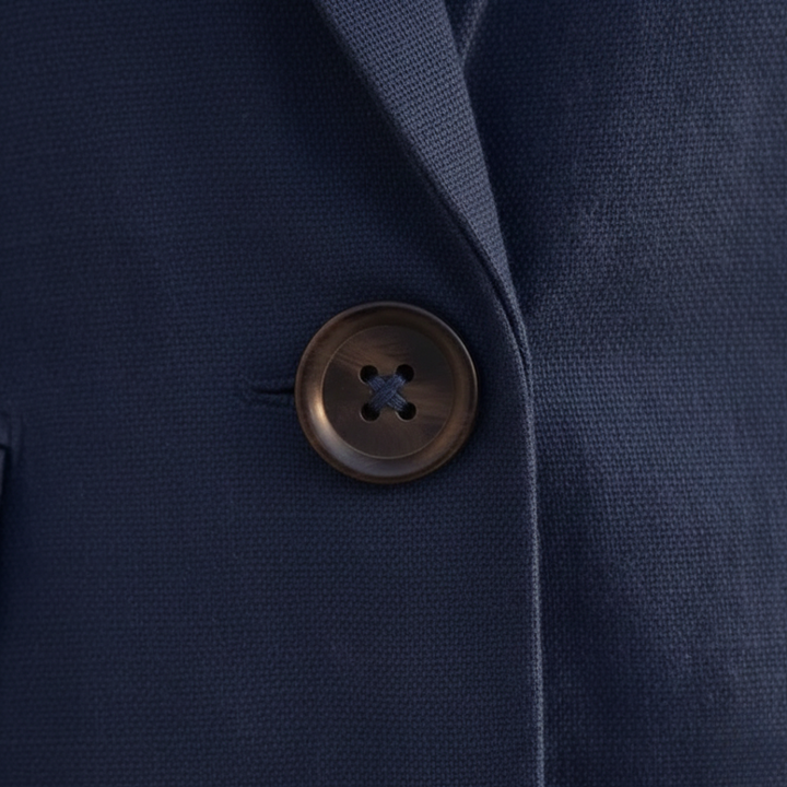 Stylish tailored shorts from a women's double-breasted blazer suit set, perfect for a summer business casual.