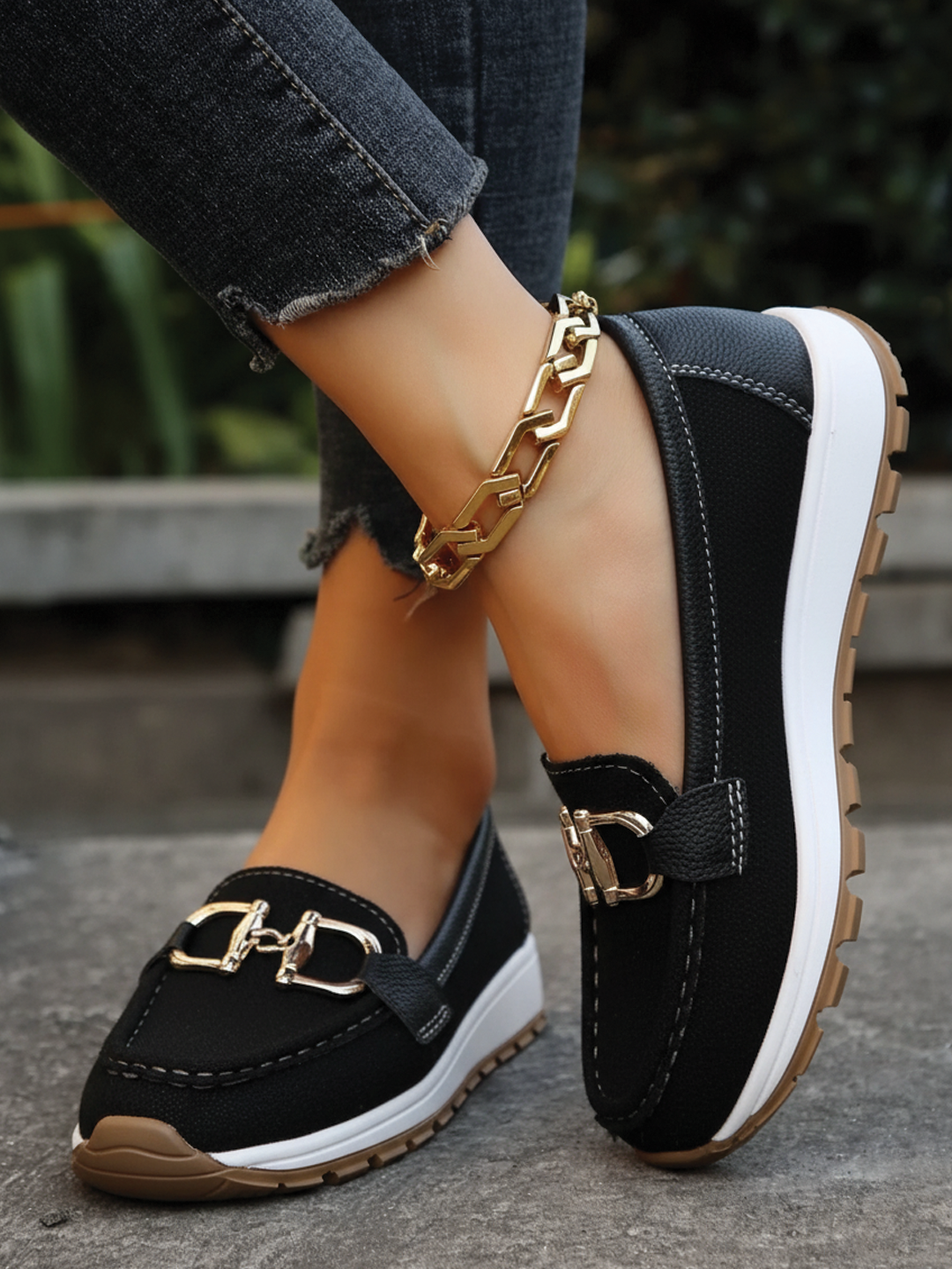 Slip-on women's flat loafers with a fashionable buckle, designed for comfort & versatile everyday style.