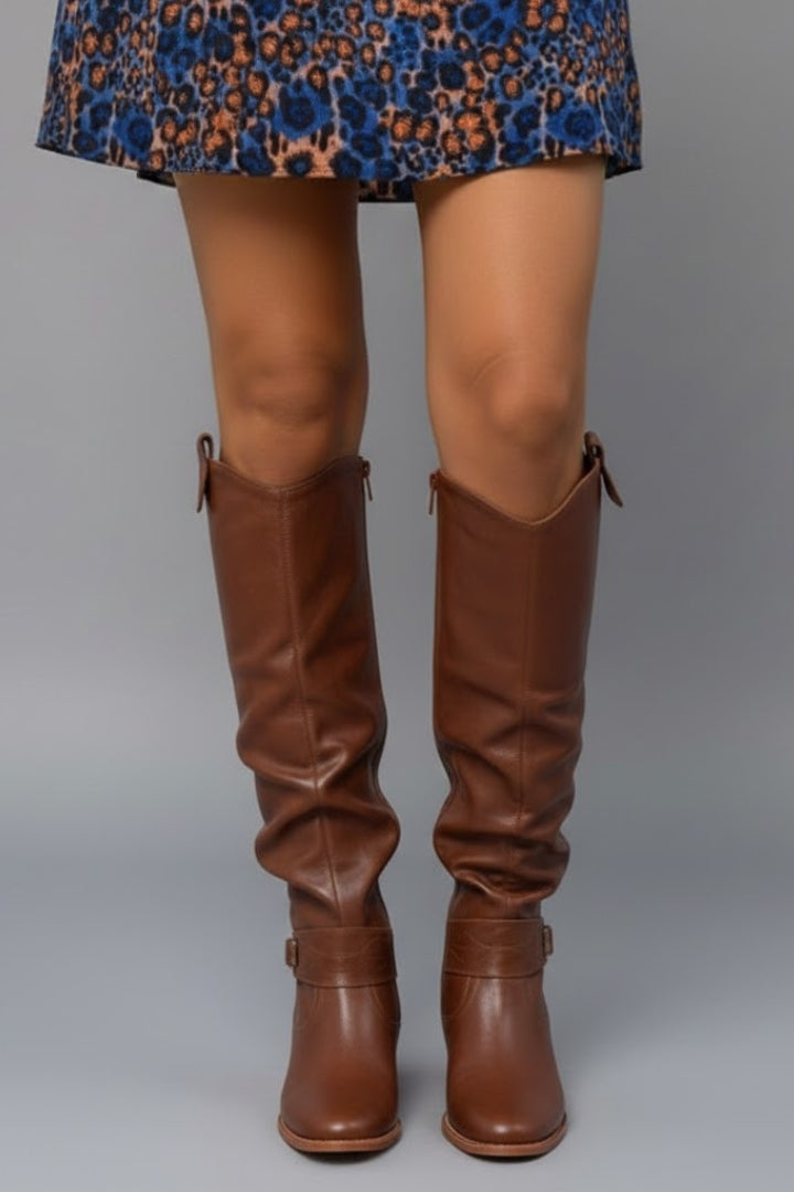 Stay warm & stylish with these comfortable women's flat heel knee-high boots for fall and winter.