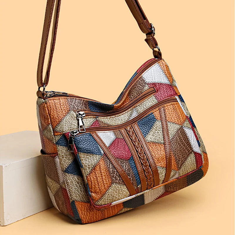 Fashion-forward women's handbag with vibrant geometric patchwork, perfect as a stylish everyday shoulder bag.