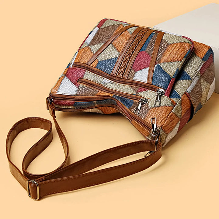 Organized women's geometric patchwork shoulder bag, a stylish and durable vegan leather accessory for daily use.