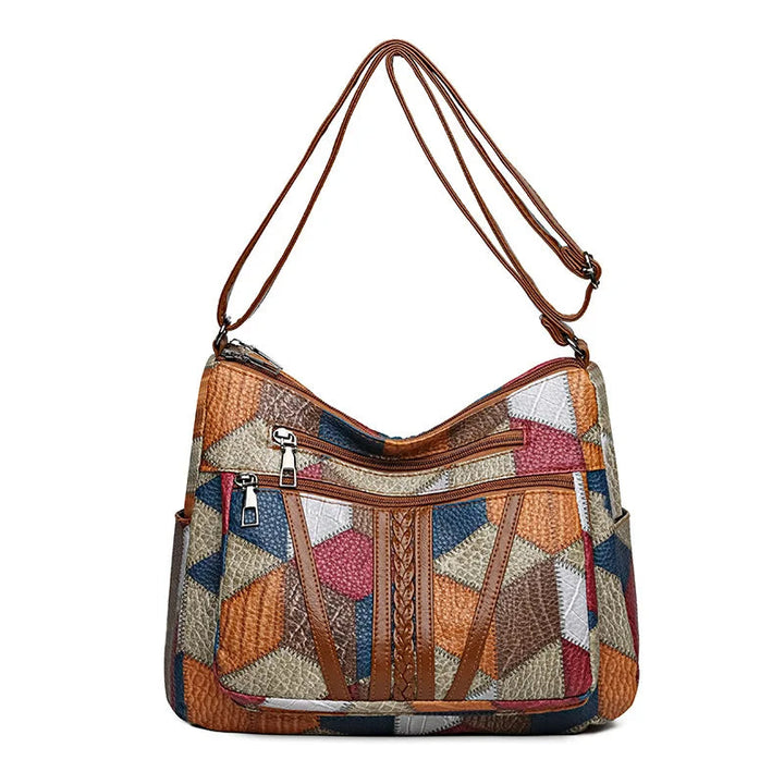 Trendy women's vegan leather bag showcasing an intricate geometric patchwork, ideal for fashion-conscious use.