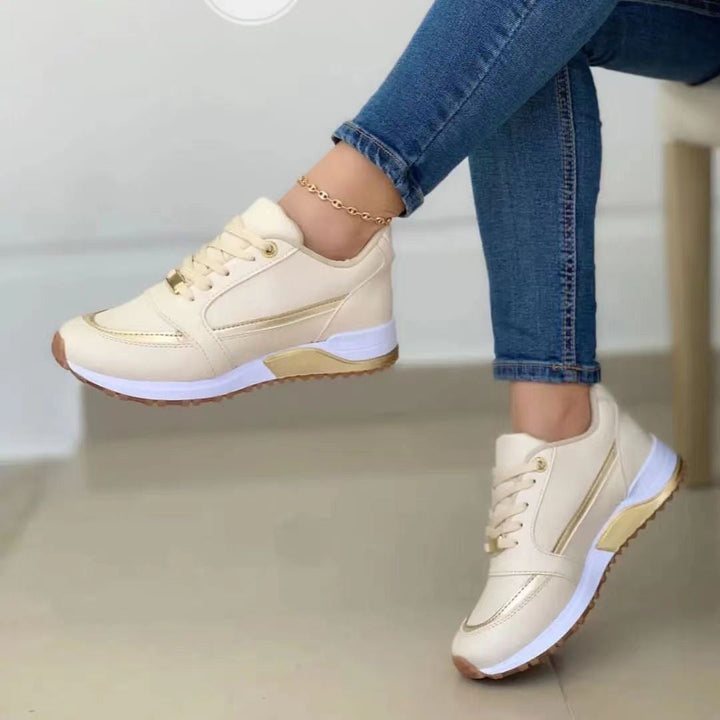 Women's stylish gold trim lace-up platform sneakers, perfect for casual everyday wear & comfort.