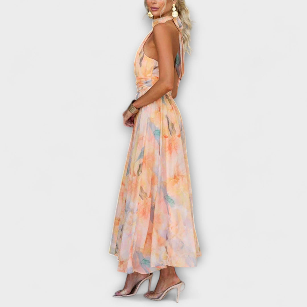 Comfortable and stylish women's summer halter maxi dress, watercolor print, and open back design for a chic look.