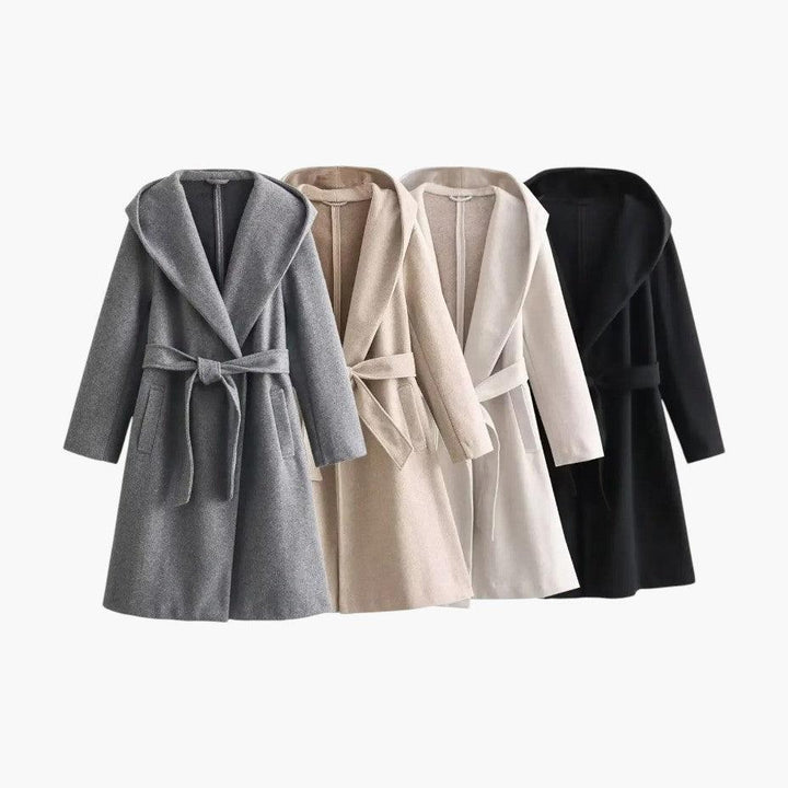 Protective & stylish women's hooded trench coat, button-front design for classic spring & fall outerwear.