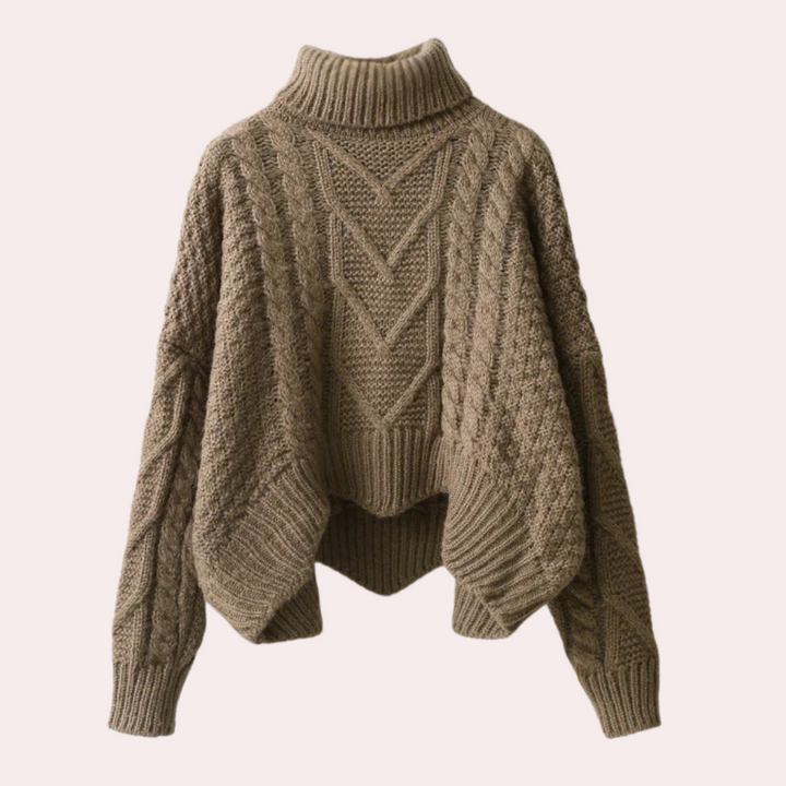 Detailed knitted turtleneck sweater for women. Cozy cotton knit, long sleeve, perfect for cool weather style.