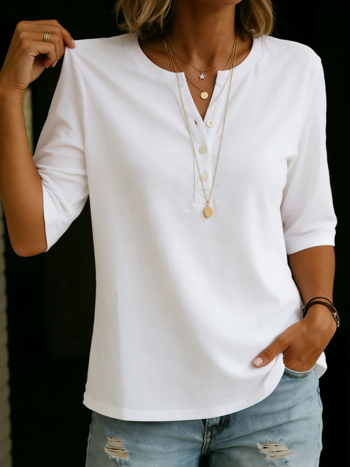 Comfortable women's 3/4 sleeve blouse with a chic notch neck, perfect for spring/summer fashion.