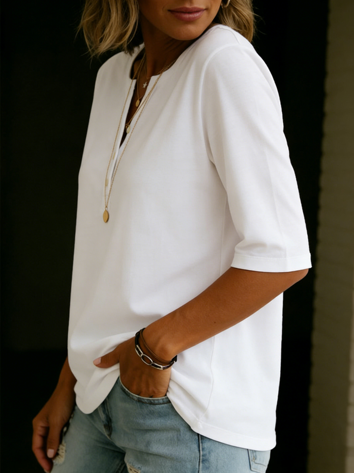 Effortlessly chic women's 3/4 sleeve shirt, featuring a trendy notch neck for casual wear.